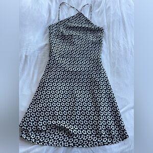 Isabella’s Cabinet Low back high neck dress with black and white flowers